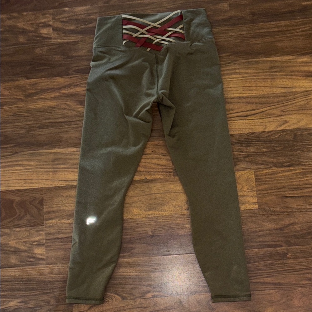 Fabletics Green Leggings with Red and Beige Crisscross